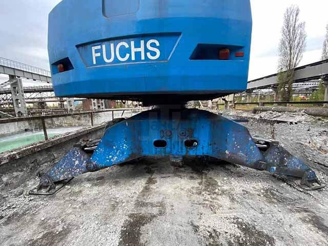 Вид сзади FUCHS MHL 360 б/у